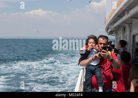 Unidentified People go by ferry through Marmara sea to Princes islands in Istanbul, Turkey.20 May 2017 Stock Photo