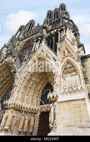 Travel to France - outdoor portal of Reims Cathedral (Notre-Dame de Reims) in summer evening Stock Photo