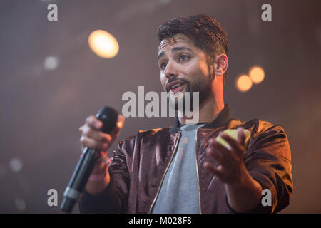 The Norwegian rap group Karpe Diem performs a live concert at the Danish music festival Roskilde Festival 2013. The duo consists of the two rappers Magdi Omar Ytreeide Abdelmaguid and Chirag Rashmikant Patel (pictured). Denmark, 07/07 2013. Stock Photo