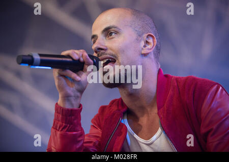 The Norwegian rap group Karpe Diem performs a live concert at the Danish music festival Roskilde Festival 2013. The duo consists of the two rappers Magdi Omar Ytreeide Abdelmaguid (pictured) and Chirag Rashmikant Patel. Denmark, 07/07 2013. Stock Photo
