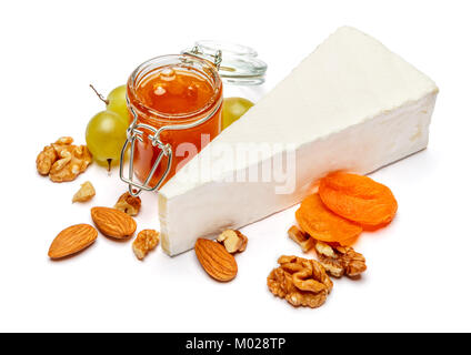 Piece of brie or camambert cheese on a white background Stock Photo