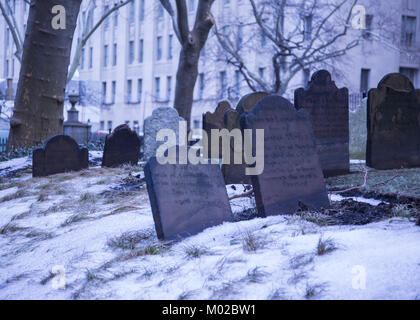 Old 18th century gravestones at Saint Paul's Chapel, Trinity Church in lower Manhattan. Stock Photo