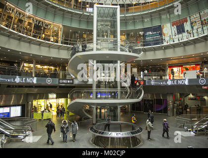 The Fulton Center is a transit center and retail complex centered at the intersection of Fulton Street and Broadway in Lower Manhattan, New York City. The complex is part of a $1.4 billion project by the Metropolitan Transportation Authority (MTA), a public agency of the state of New York, to rehabilitate the Fulton Street New York City Subway station, and construct new underground passageways and access points into the complex. The complex officially opened on November 10, 2014, Stock Photo