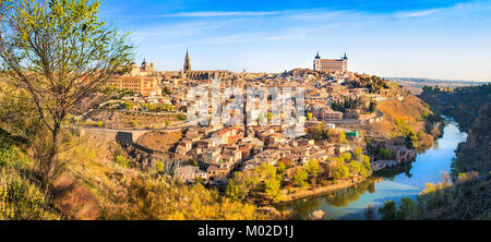 Panoramic view of the historic city of Toledo with river Tajo at sunset in Castile-La Mancha, Spain