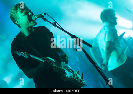 The Norwegian indie rock band Rumble in Rhodos performs a live concert at Parkteatret in Oslo. Here musician and guitarist Henrik Lie is pictured live on stage. Norway, 26/10 2013. Stock Photo