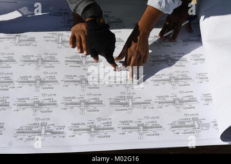 Indian Civil Engineers and foremen are working on the construction site Stock Photo