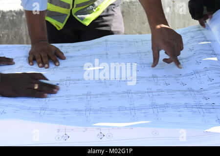 Indian Civil Engineers and foremen are working on the construction site Stock Photo