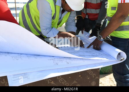 Indian Civil Engineers and foremen are working on the construction site Stock Photo