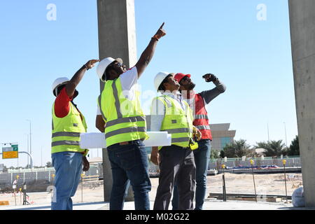 Indian Civil Engineers and foremen are working on the construction site Stock Photo