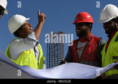 Indian Civil Engineers and foremen are working on the construction site Stock Photo