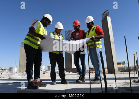 Indian Civil Engineers and foremen are working on the construction site Stock Photo