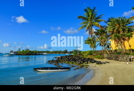 Mahebourg, Mauritius - Jan 9, 2017. Kayaks on beach in Mahebourg, Mauritius. Mauritius is a major tourist destination, ranking 3rd in the region. Stock Photo