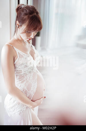 Portrait of a beuatiful pregnant woman Stock Photo