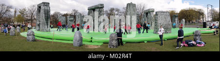 kids enjoy plastic version of Stonehenge by Turner Prize winning artist Jeremy Deller on Glasgow green before it went to London Olympic Games 2012 Stock Photo