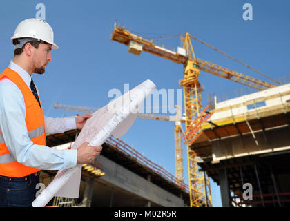 construction manager/ engineer planning house construction Stock Photo
