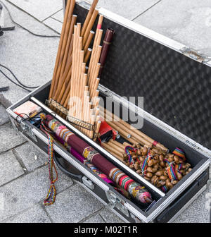 Andean musical instruments in case on street. Pan flutes, zampona, siku.  Folk music. Stock Photo