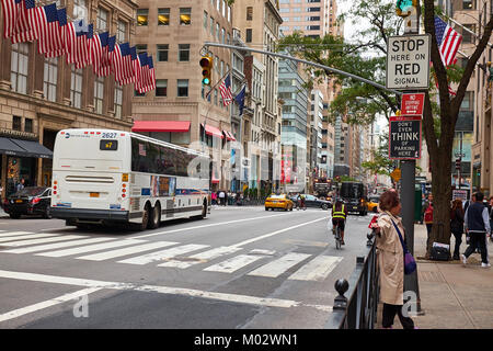 NEW YORK CITY - SEPTEMBER 29, 2016: 5th Avenue with many signs, one saying 'Don't even think of parking here' Stock Photo