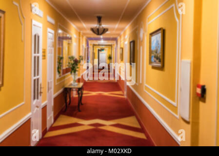 Blurred hotel corridor in brown and orange colours Stock Photo
