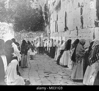 An early 20th century black and white photograph showing women praying at the Wailing Wall in Jerusalem. Stock Photo