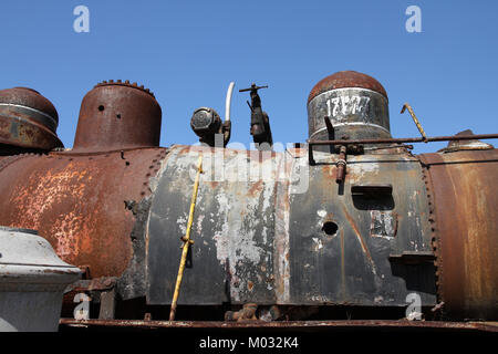 Close up of an old, rusty steam locomotive ready to be scrapped in Havana, Cuba Stock Photo