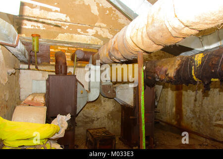 Old air handling unit. The abandoned and ruined storage room for vegetables. It was built in the times of the USSR. Stock Photo