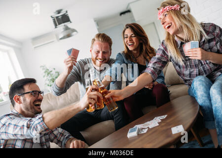 Young students and friends celebrating ahd having fun while drinking Stock Photo