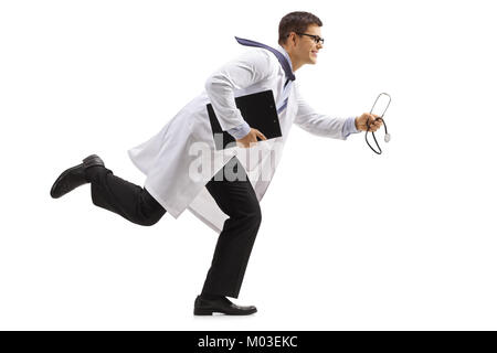 Full length profile shot of a doctor with a clipboard and a stethoscope running isolated on white background Stock Photo