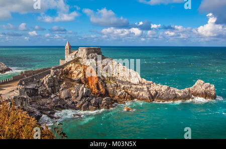 Beautiful view of the famous gothic Church of St. Peter (Chiesa di San Pietro) in the town of Porto Venere, Ligurian Coast, La Spezia, Italy Stock Photo