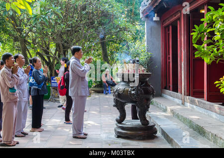 Hanoi,Vietnam - November 2,2017 : Prayers can seen praying in Ngoc Son Temple in Hanoi,Vietnam. Stock Photo