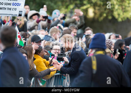 Cardiff, UK. 18th Jan, 2018. eager crowds greet Prince Harry and Ms Meghan Markle on their royal engagement tour of Britain Credit: Beks Matthews/Alamy Live News Stock Photo