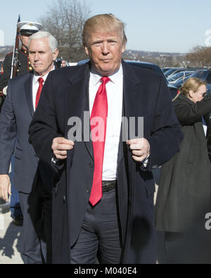 Washington, District of Columbia, USA. 18th Jan, 2018. United States President DONALD J. TRUMP walks to the press pool to make a statement prior to going into the Pentagon in Washington, DC for meetings. At left is US Vice President MIKE PENCE. Credit: Ron Sachs/CNP/ZUMA Wire/Alamy Live News Stock Photo