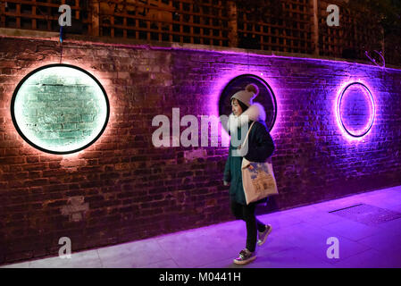 London, UK. 18th Jan, 2018. A woman walks by 'Harmonic Portal' by Chris Plant in Jermyn Street. Opening night of Lumiere London, the capital's largest arts festival commissioned by The Mayor of London and produced by Artichoke. Light installations by leading artists have been set up, both north and south of the river for the public to view 18-21 January. Credit: Stephen Chung/Alamy Live News Stock Photo