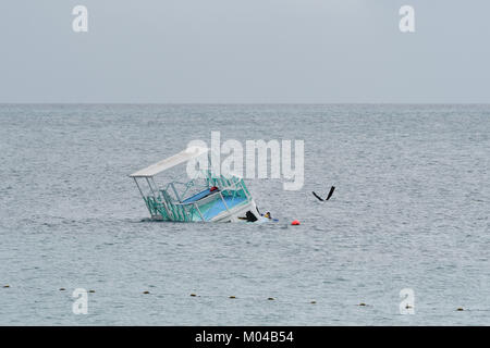 Sinking boat Stock Photo