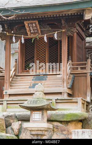 An outdoor shinto altar in the early morning winter. Stock Photo