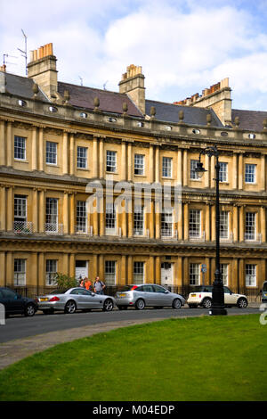 Bath, UK - 20th August 2010: Historic terraced houses in The Circus. Completed in 1768 this example of Georgian architecture was designed by John Wood the Elder.  Historic terraced houses in The Circus, Bath, UK Stock Photo