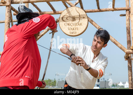 Unidentified people perform medieval fight show with swords in retro costume of ancient Turkish troops and ottoman empire soldier.ISTANBUL,TURKEY,MAY  Stock Photo