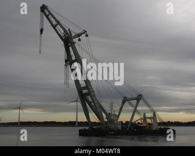 Brabo 800T barge crane - ENI 06105424 at sunrise, Port of Antwerp Stock Photo