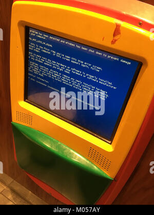 The Blue Screen of Death (BSoD) occurred at a McDonald's location, possibly due to a computer error. BSoD is a critical system error that occurs in Microsoft Windows operating systems. Stock Photo