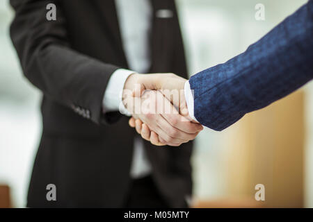 concept of a reliable partnership : a handshake of business partners Stock Photo