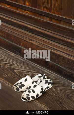 Slippers on a step of a temple at the Konchi-in garden in Kyoto, Japan. Stock Photo