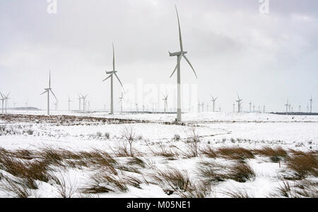 View of wind turbines at Whitelee Windfarm after snow fall in winter  operated by Scottish power, Scotland, United Kingdom