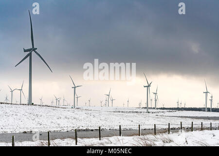 View of wind turbines at Whitelee Windfarm after snow fall in winter  operated by Scottish power, Scotland, United Kingdom
