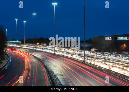 Night view of traffic on M8 Motorway during bad weather in central Glasgow, Scotland, United Kingdom. Stock Photo