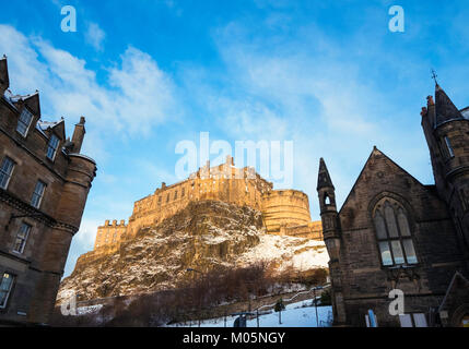 View of Edinburgh Castle from the Grassmarket after snowfall during winter in  Scotland, United Kingdom Stock Photo