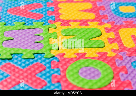 Close up view of foam puzzle letter uppercase game. Stock Photo