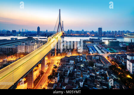 Yangpu Bridge in the morning, crossing the Huangpu River, Shanghai, China. Stock Photo