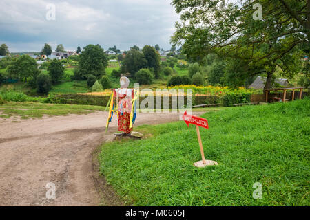 Scarecrow in a national costume in the estate of Count Leo Tolstoy in Yasnaya Polyana in September 2017. Stock Photo