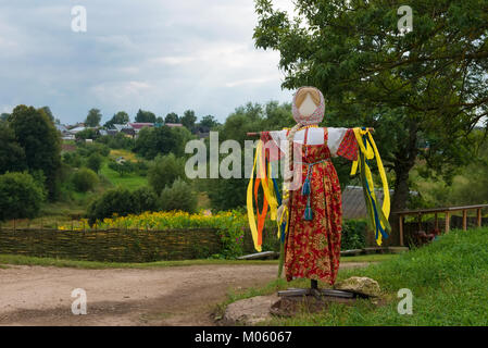 Scarecrow in a national costume in the estate of Count Leo Tolstoy in Yasnaya Polyana in September 2017. Stock Photo