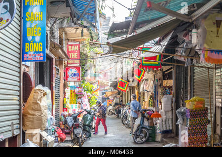 Hanoi,Vietnam - October 31,2017 : Local daily life of the street in Hanoi, Vietnam. People can seen exploring around it. Stock Photo