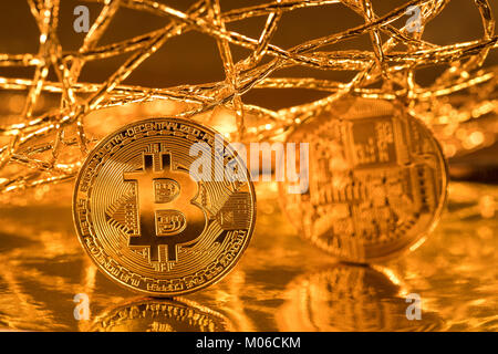 View of golden coins of Bitcoin cryptocurrency in the global network Stock Photo